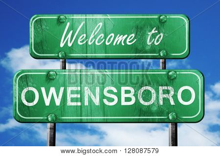owensboro vintage green road sign with blue sky background
