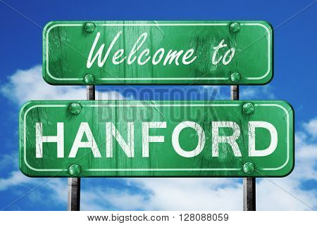 hanford vintage green road sign with blue sky background