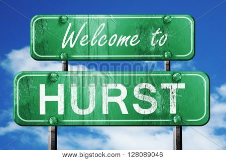 hurst vintage green road sign with blue sky background