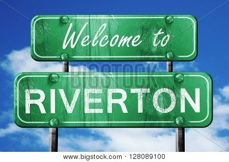 riverton vintage green road sign with blue sky background