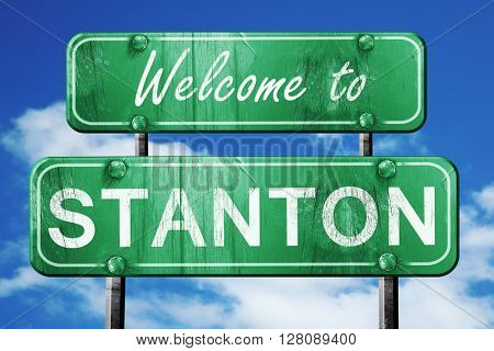 stanton vintage green road sign with blue sky background