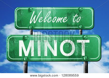 minot vintage green road sign with blue sky background