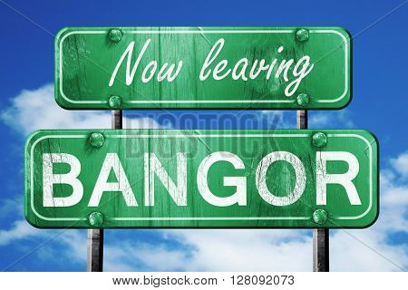 Leaving bangor, green vintage road sign with rough lettering