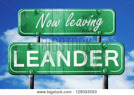 Leaving leander, green vintage road sign with rough lettering