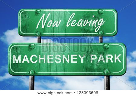 Leaving machesney park, green vintage road sign with rough lette