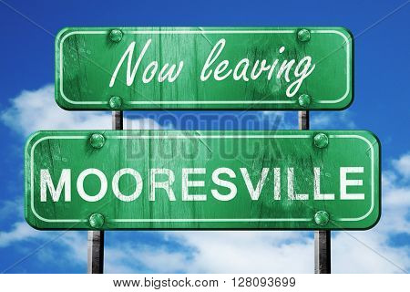 Leaving mooresville, green vintage road sign with rough letterin