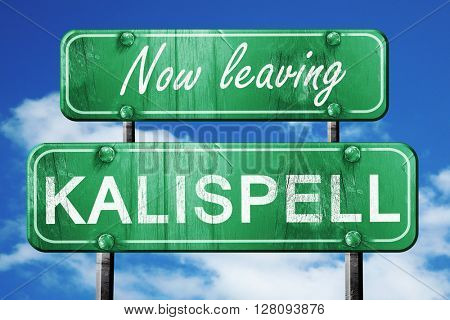 Leaving kalispell, green vintage road sign with rough lettering