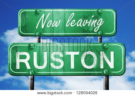 Leaving ruston, green vintage road sign with rough lettering