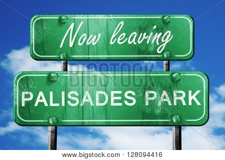 Leaving palisades park, green vintage road sign with rough lette