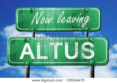 Leaving altus, green vintage road sign with rough lettering