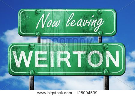 Leaving weirton, green vintage road sign with rough lettering