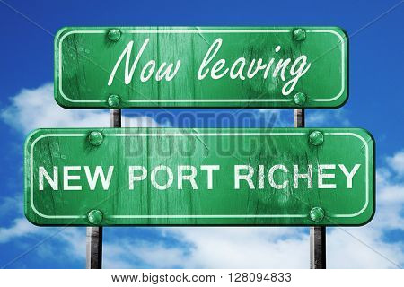 Leaving new port richey, green vintage road sign with rough lett