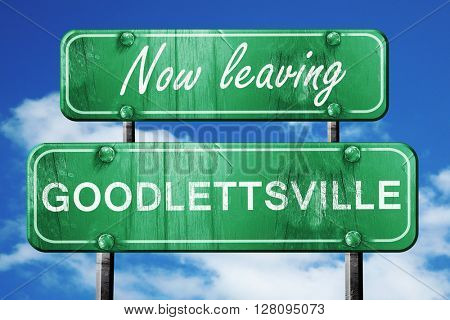 Leaving goodlettsville, green vintage road sign with rough lette