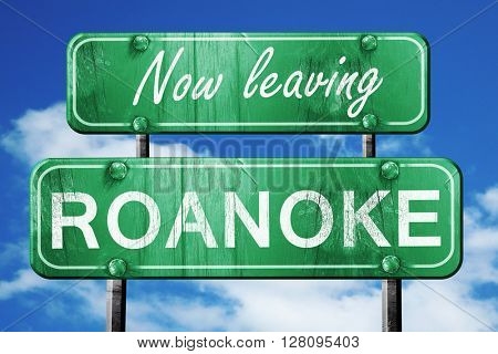 Leaving roanoke, green vintage road sign with rough lettering