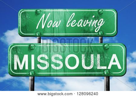 Leaving missoula, green vintage road sign with rough lettering