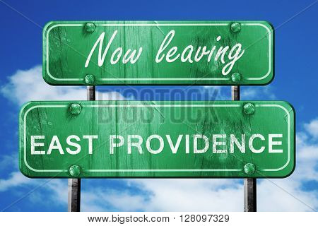 Leaving east providence, green vintage road sign with rough lett