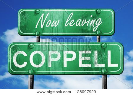 Leaving coppell, green vintage road sign with rough lettering