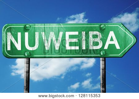 nuweiba road sign, 3D rendering, vintage green with clouds backg