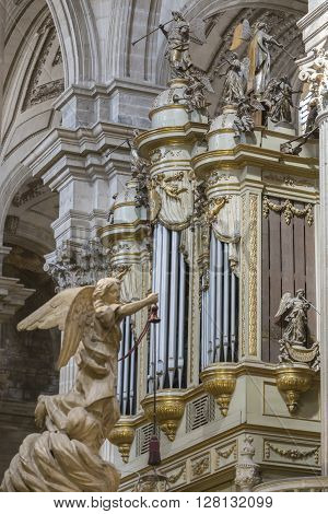 Jaen, Spain - may 2016 2: Monumental main organ inside the choir is one of the biggest of Spain, The organ this insert in baroque structure, is the work of Jose Garcia and Manuel Lopez (1870), Jaen, Spain