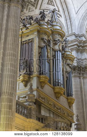 Jaen, Spain - may 2016 2: Monumental main organ inside the choir is one of the biggest of Spain, The organ this insert in baroque structure, is the work of Jose Garcia and Manuel Lopez (1870), Jaen, Spain