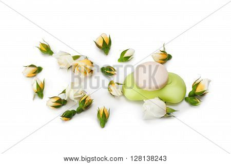 Natural soap with the aroma roses and flowers of roses isolated on white background.