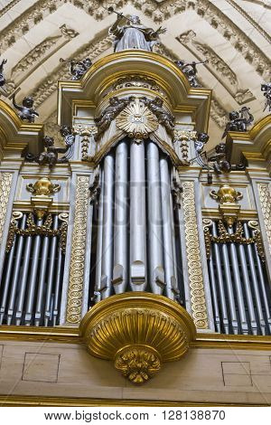 Jaen, Spain - may 2016 2: Monumental main organ inside the choir is one of the biggest of Spain, The organ this insert in baroque structure, is the work of Jose Garcia and Manuel Lopez (1870), Jaen, Spain