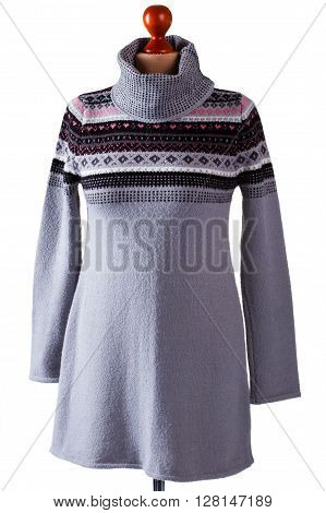 Gray sweater with high collar. Gray pullover on headless mannequin. Lady's woolen garment in studio. Warm handmade sweatshirt on sale.
