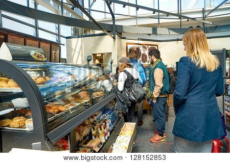 CHICAGO, IL - CIRCA APRIL, 2016: Starbucks Cafe at O'Hare Airport. Starbucks Corporation is an American global coffee company and coffeehouse chain based in Seattle, Washington