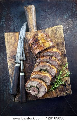 Rolled Lamb Roast on Cutting Board