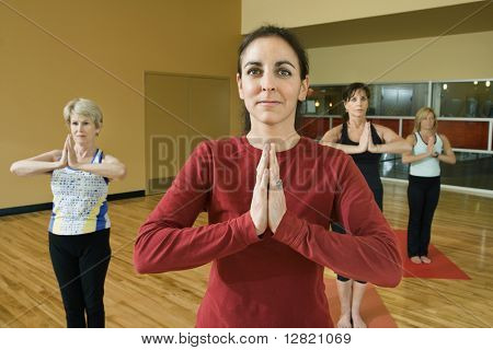 Prime adult female Caucasians in yoga class.