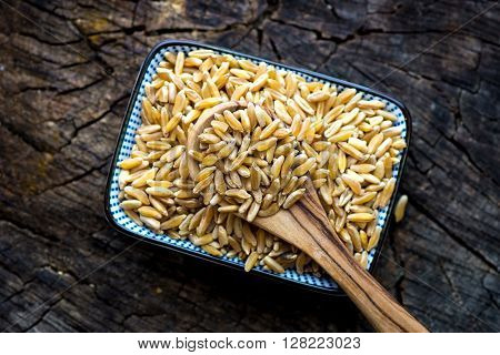 Organic Kamut Grain On Wooden Background