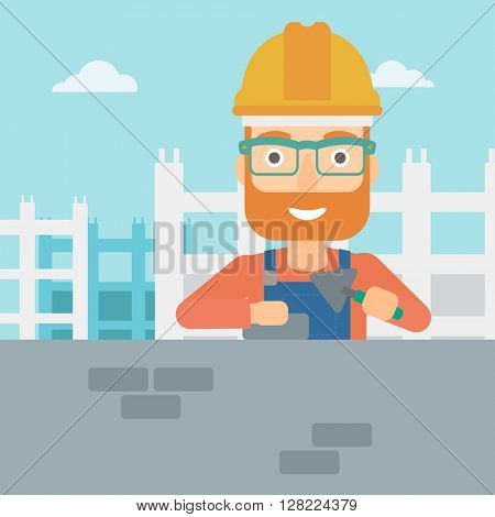 Bricklayer with spatula and brick.