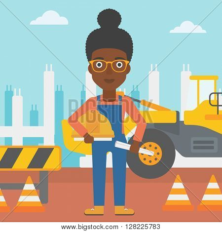 Engineer with hard hat and blueprint.