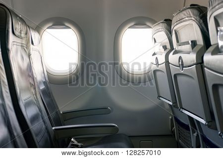 FRANKFURT, GERMANY - APRIL 07, 2016: inside of Lufthansa A320 economy class.  Deutsche Lufthansa AG, commonly known as Lufthansa is a major German airline.