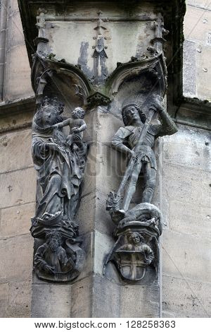 TUBINGEN, GERMANY - OCTOBER 21: Virgin Mary with baby Jesus and Saint George, Collegiate Church of St. George in Tubingen, Germany on October 21, 2014.