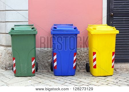 Recycling and Sorting Plastic Wheelie Bins Trash Cans