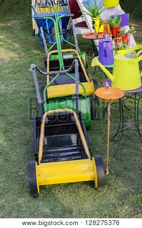 Lawn Mowers And Watering Cans