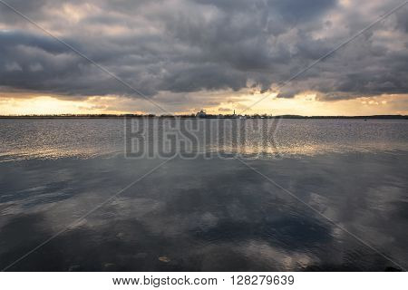 Cold evening and the sunset on a small lake.