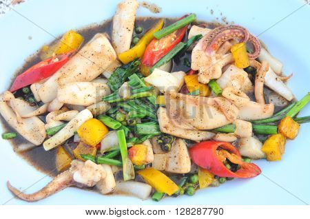 fried squid in the black pepper delicious spices of thaifood