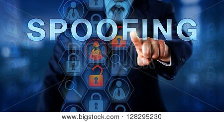 Cyber security specialist is pushing SPOOFING on an interactive touch screen interface. Information technology concept and computer security metaphor for a program masquerading as another.