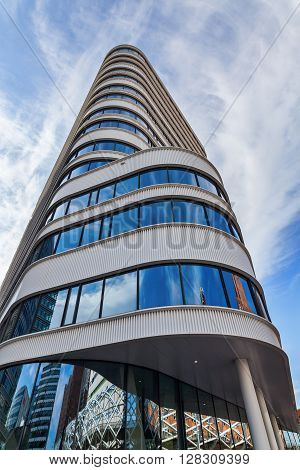 The Hague Netherlands - April 21 2016: Monarch Tower in The Hague. It is a 15 storey and 6246 m high office building designed by Meyer van Schoten architects completed 2013