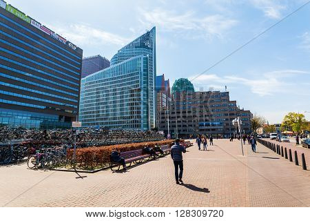 The Hague Netherlands - April 21 2016: forecourt of the main station with unidentified people. It is with twelve tracks the largest terminal station in the Netherlands. It was completed in 1973