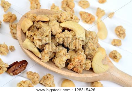 Closeup healthy muesli in a wooden spoon