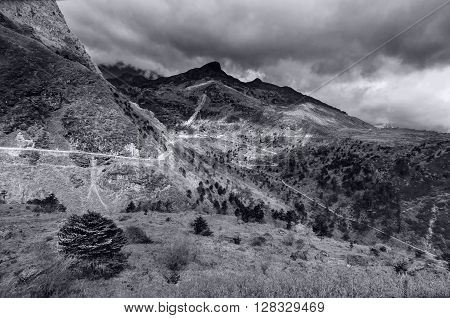 Beautiful famous curvy roads on Old Silk Route Silk trading route between China and India Sikkim - black and white image