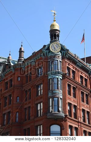 WASHINGTON DC - APR 17: Historic SunTrust building in Washington DC, as seen on April 17, 2016. The building is constructed in red brick, and elaborately detailed with copper and terra cotta.