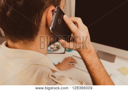 Close up photo of successful businessman having conversation with clients