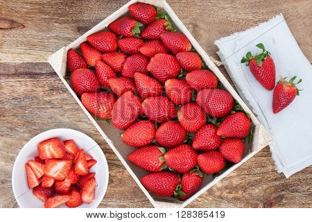Beautiful large strawberries on a wooden table