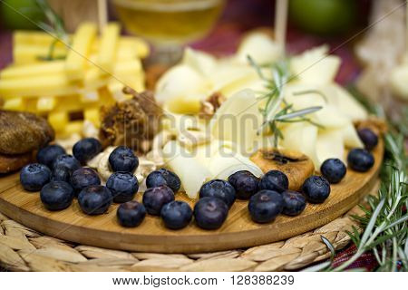 Still life photo with Georgian cheese apple grape etc