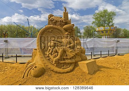 MOSCOW RUSSIA - May 1 2016: The exhibition contest of sand sculptures in Kolomenskoye Park. Composition "Beautiful future" by Sergei Knish. This sculpture is inspired by the books of Soviet science fiction writers (Kir Bulychev Strugatsky brothers).