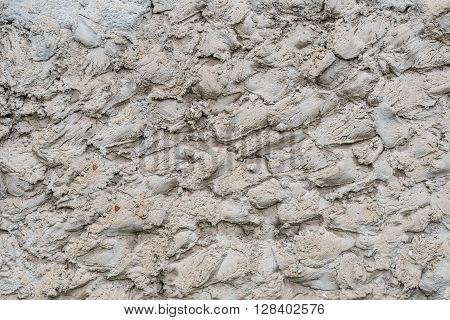 rough cement the wall with scabrous strokes